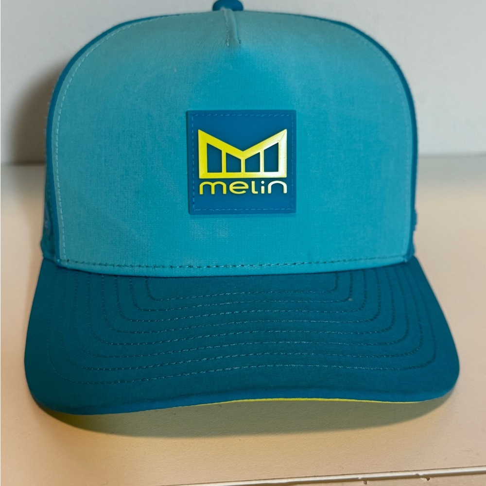 Melin Brand Two-Tone Teal & Cyan Trucker Hat with Yellow Logo